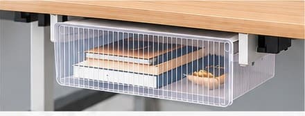 Clear fluted under-desk drawer holding books